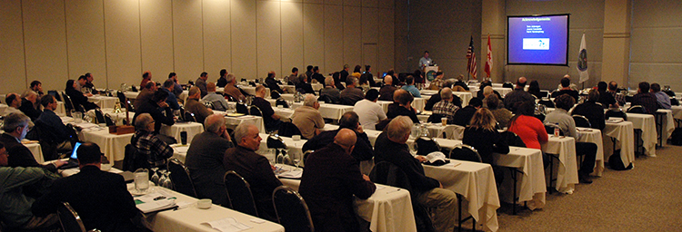 2015 lake committee meeting.  Participants in a meeting room watching presentation.